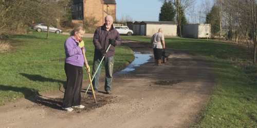tidying the road to Railway Cottages